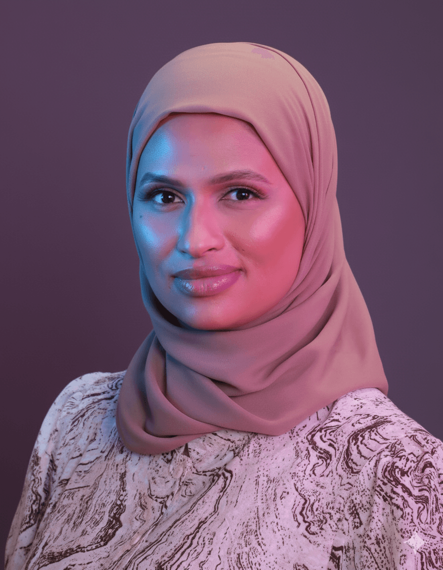 Habiba speaking on a panel, holding a microphone.